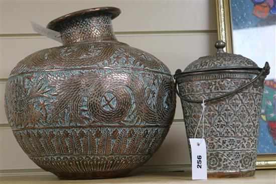 A Benares embossed copper vessel and an Iranian lidded copper bucket (2)